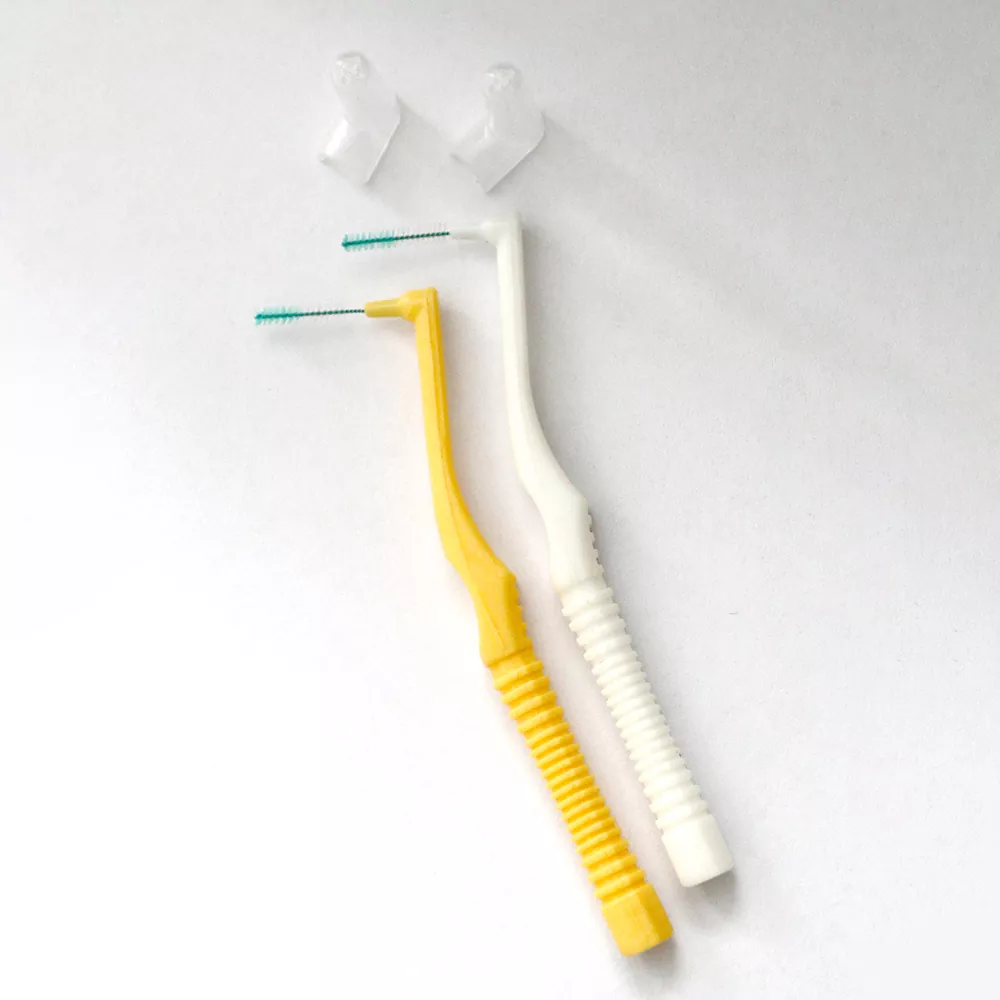 Sikat interdental kanggo mbusak plak